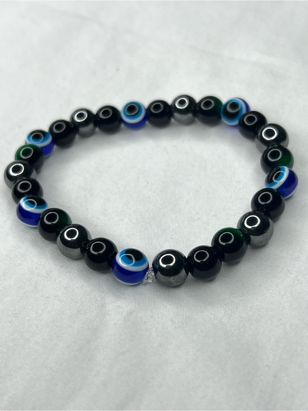 Black Beaded blue Evil Eye Stretch Bracelet with green Tiger eyes